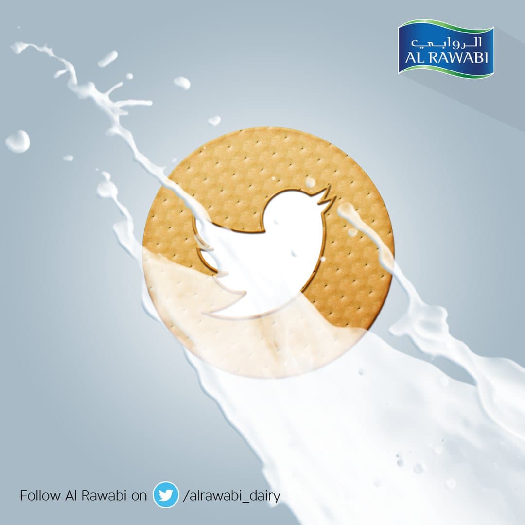 Twitter bird on a round biscuit surrounded by milk splashes, and a Follow Al Rawabi on Twitter line
